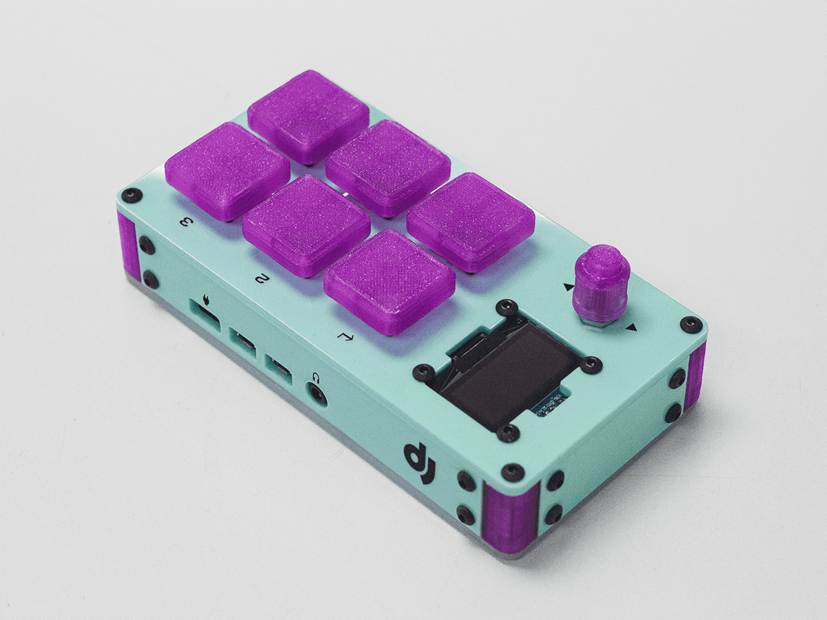 Djavu DIY audio kit assembled with knobs and pads on a table.