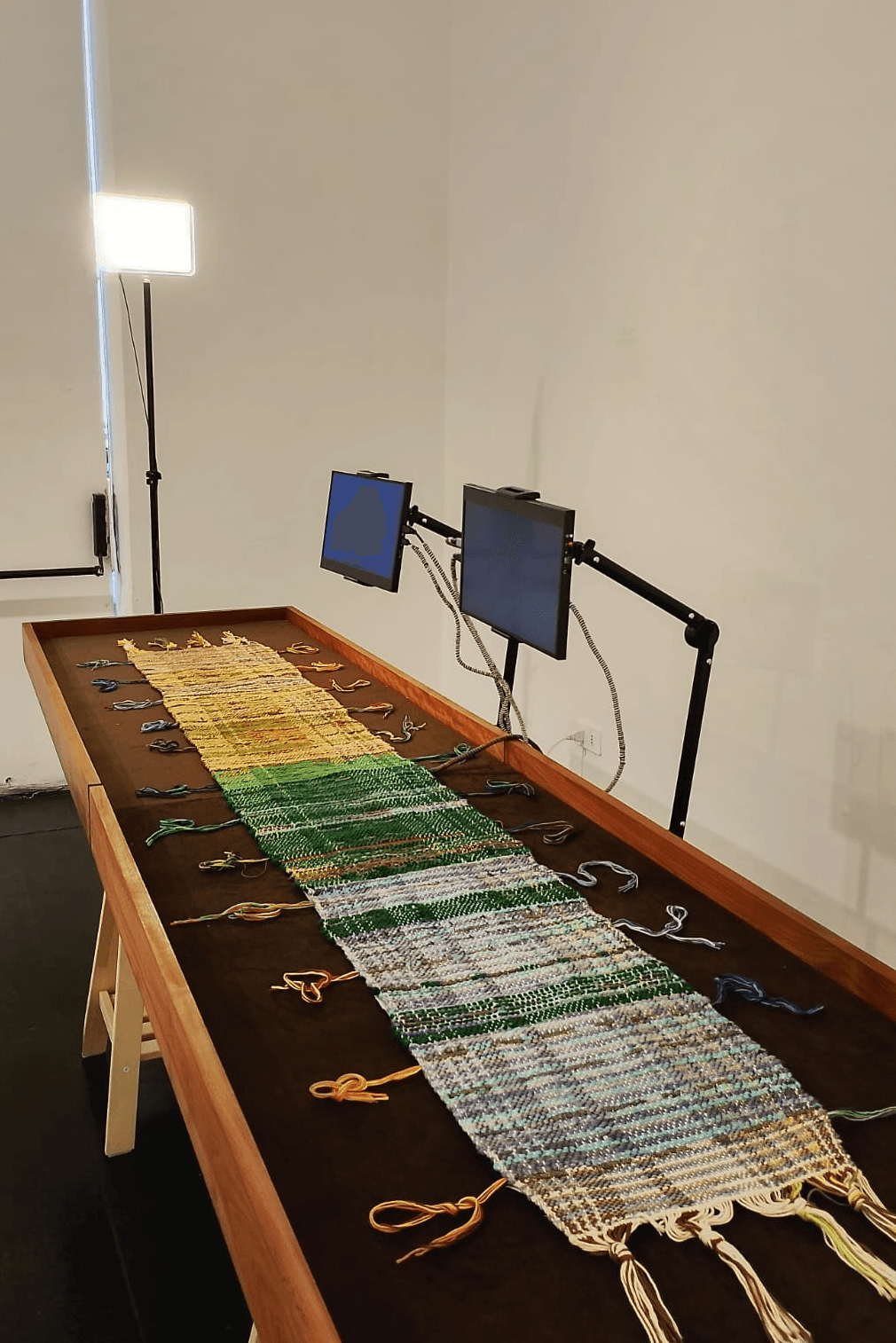 Close-up of conductive woven textile showing material transitions.