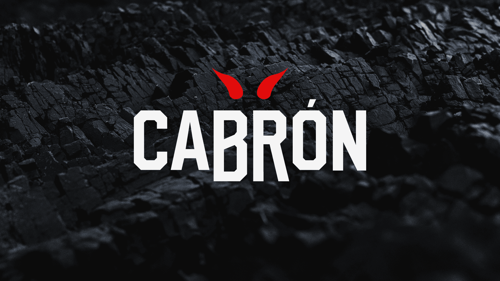 Cabrón mark over a charcoal texture background